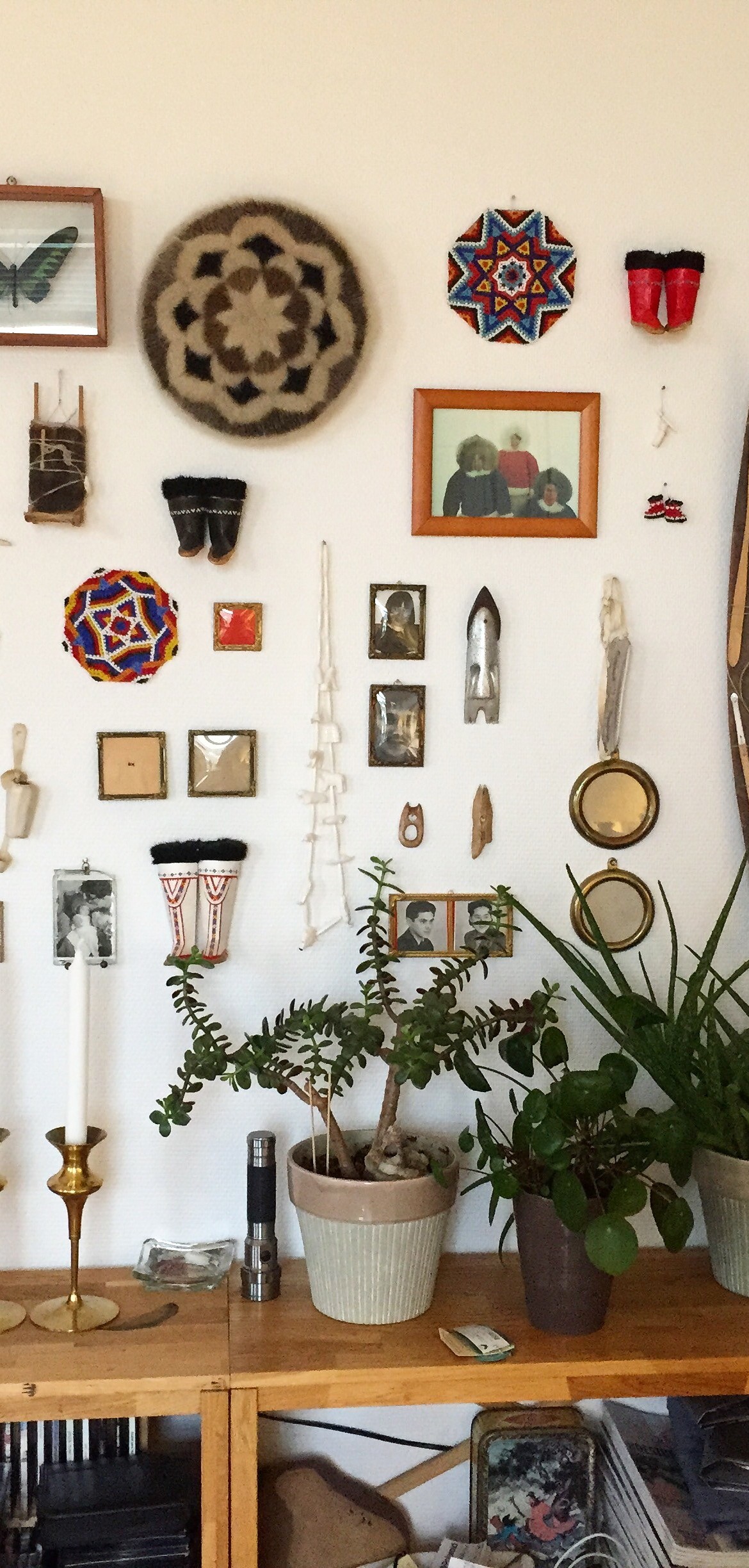 A wall displaying a medley of interesting objects.