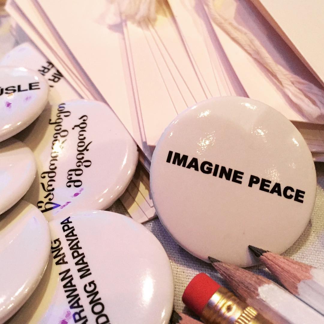 An "Imagine Peace" button.