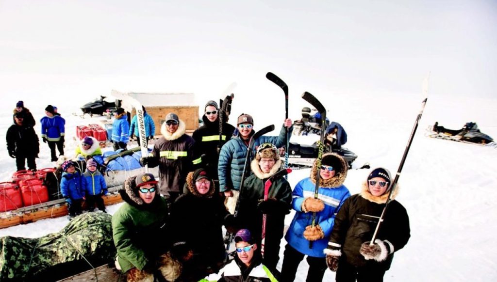 The local hockey team prepares for a journey to play in Igloolik.